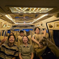 Hire a van with a driver to Bangkok.